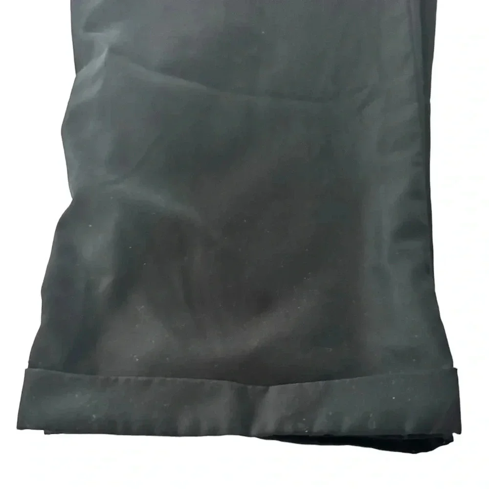 Greg Norman black, pleated golf slacks with a cuff.  Size 38x30